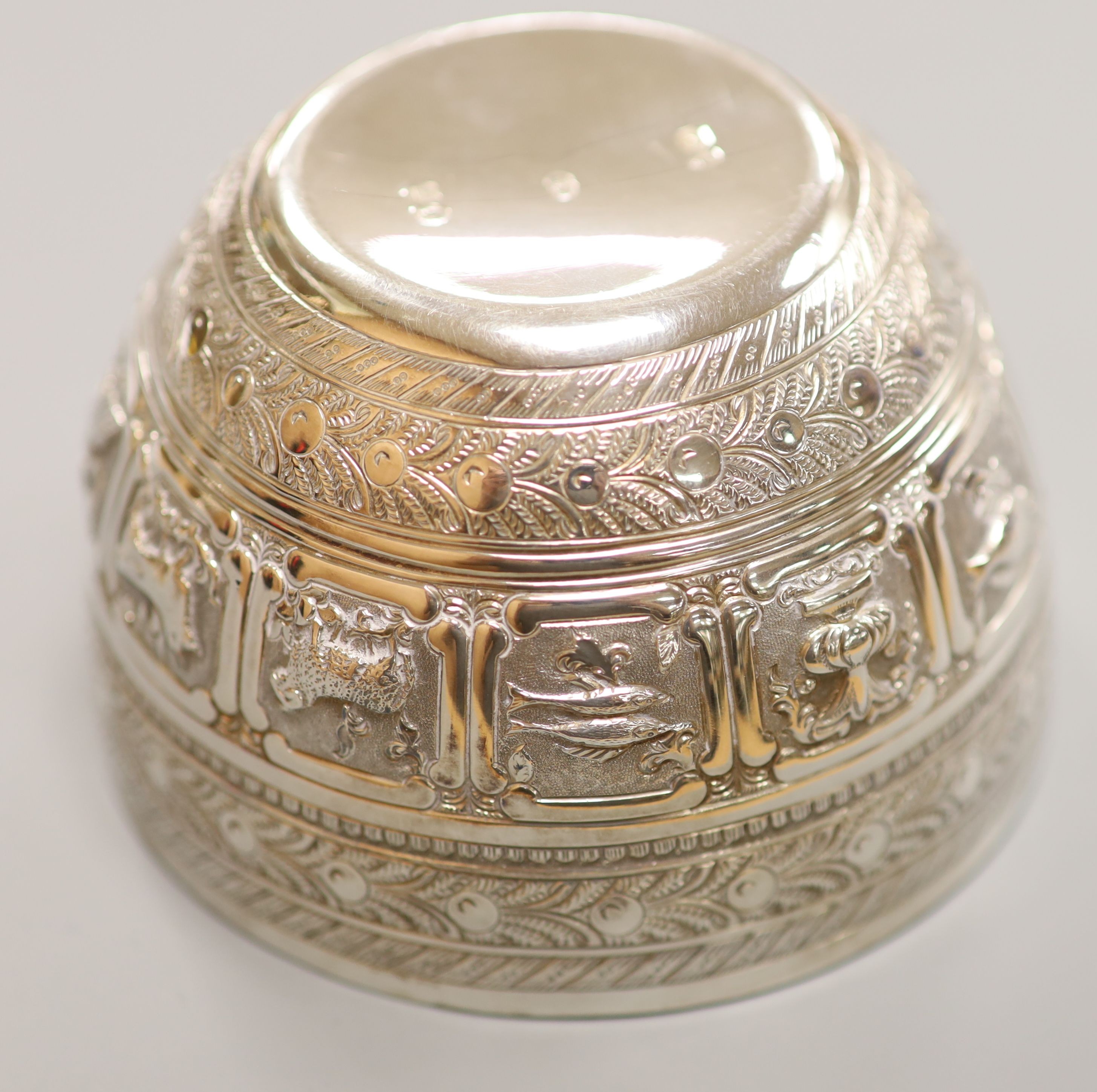 A Victorian silver 'zodiac' sugar bowl, Charles Boyton, London, 1880, height 6cm, 99 grams.